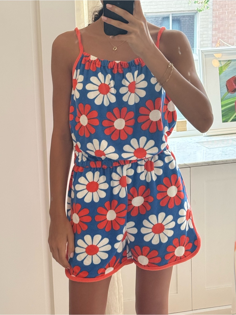 Girls Blue One-Piece Romper with orange and white flowers